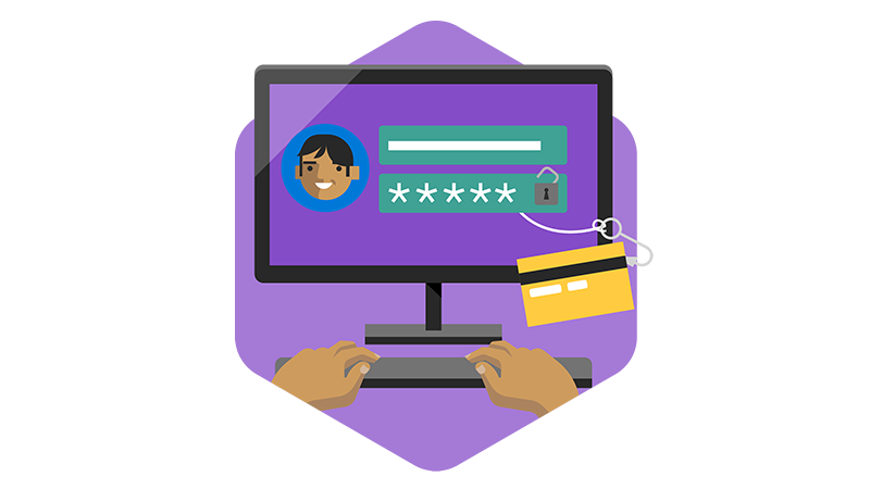 A close-up of a computer screen and a credit card