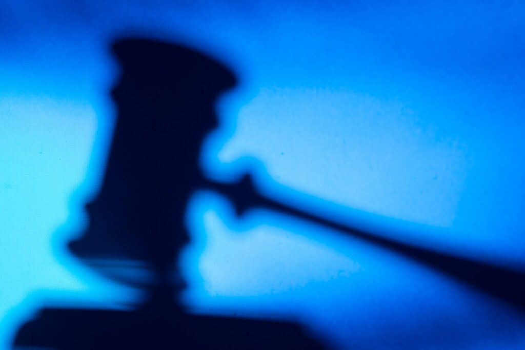 gavel with blue background