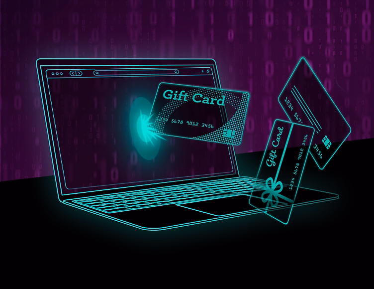 A laptop with gift cards and credit cards flying out of it