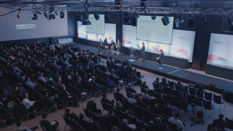 A large crowd attend a Finastra panel.