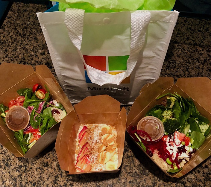 A photo of the gift bag with 3 boxes of salads