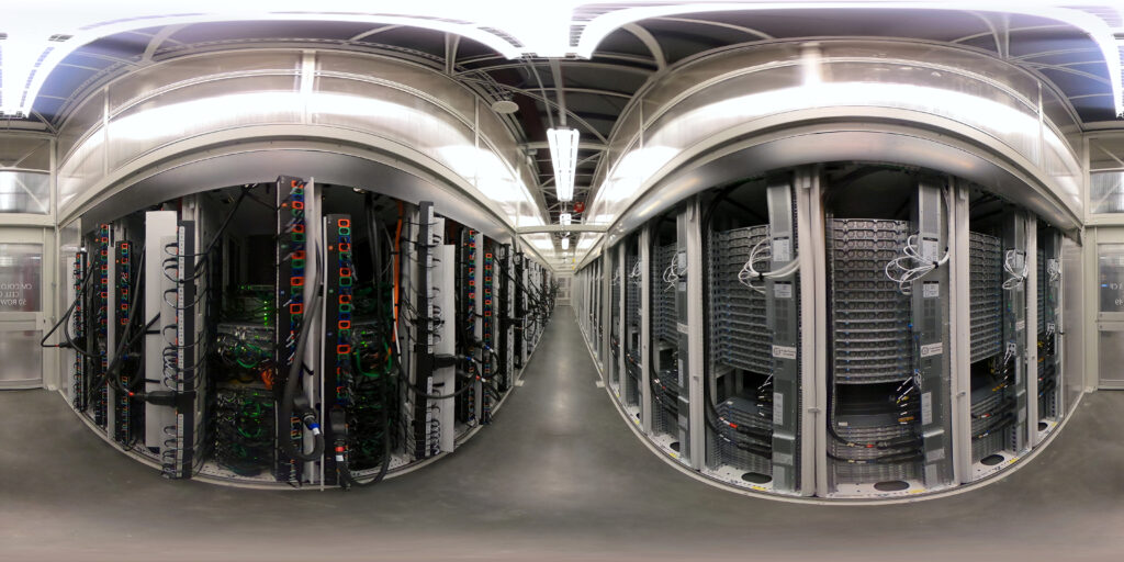 360 view of hot aisle in datacenter interior with servers on either side