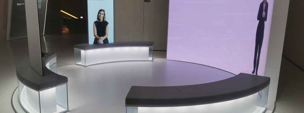 Round waiting room with images on the wall