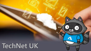 A photo of a tablet computer with a cloud on top of it, with a drawing of Bit the Raccoon on the right.