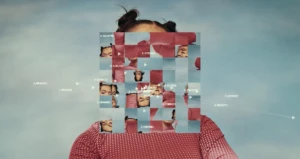 A person's face obscured by a digital grid of shuffled image fragments and numerical data points