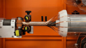 Manufacturing of superconducting cables involves precision winding of HTS tapes around the core of the future cable