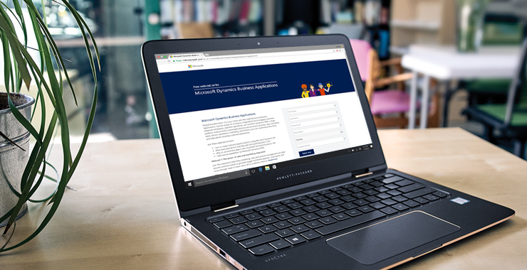 a laptop computer sitting on top of a table