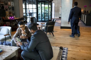 a group of people sitting at a table