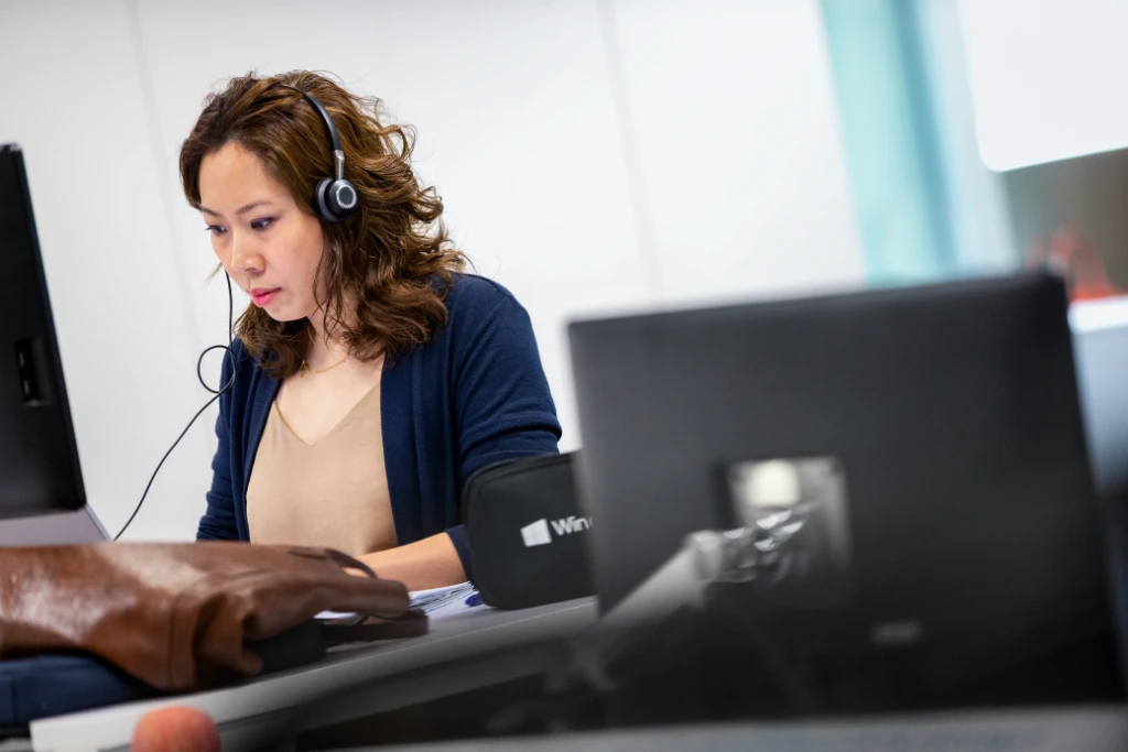 A woman using a laptop computer