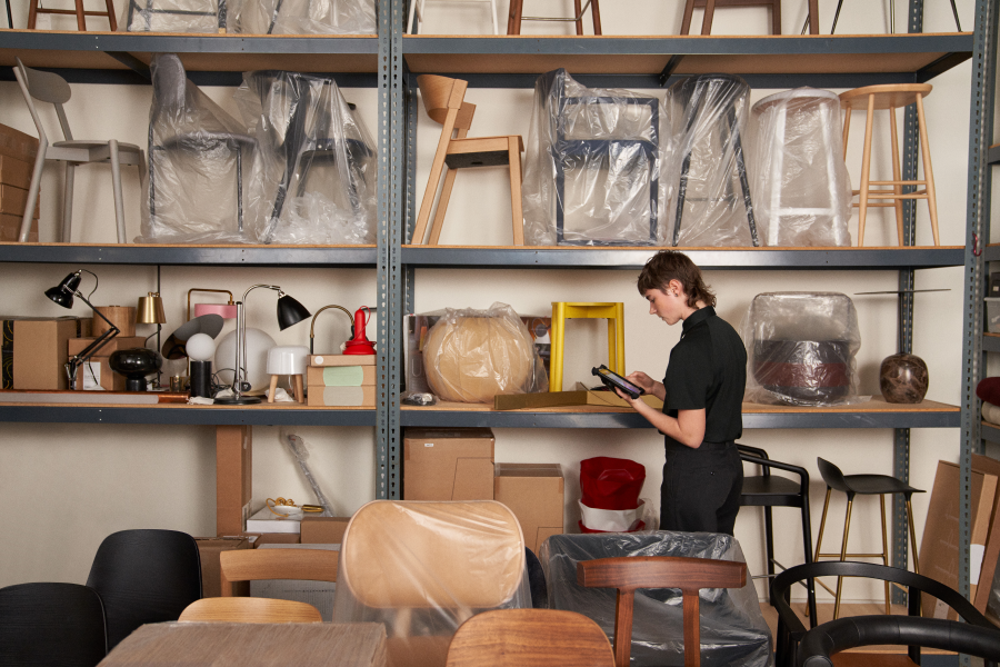 a person sitting at a table in a room