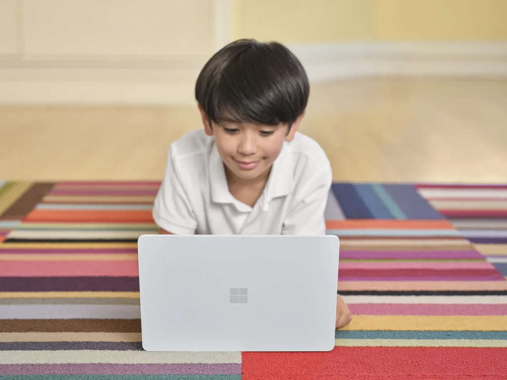Kid laptop on carpet v2
