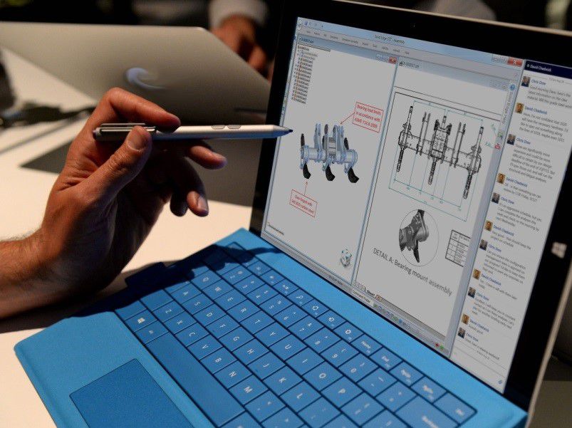 Zoomed up picture of someone using a touch pen on a microsoft tablet