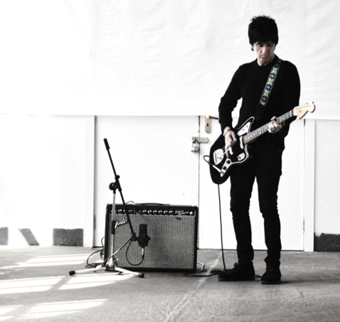Johnny Marr playing the guitar