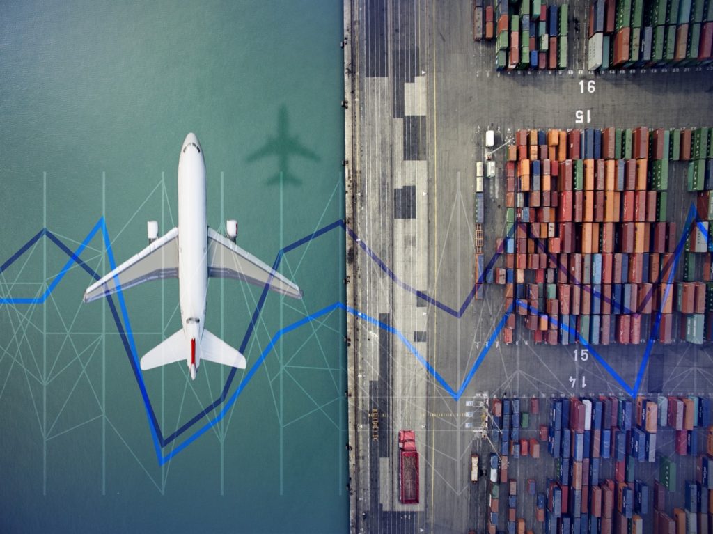 An image of a plane and a cargo ship.