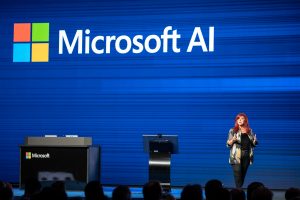 Mitra Azizirad , Microsoft executive, speaking on Microsoft AI stage at an event