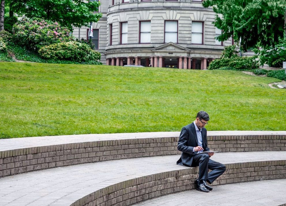 Man working outside of Government building
