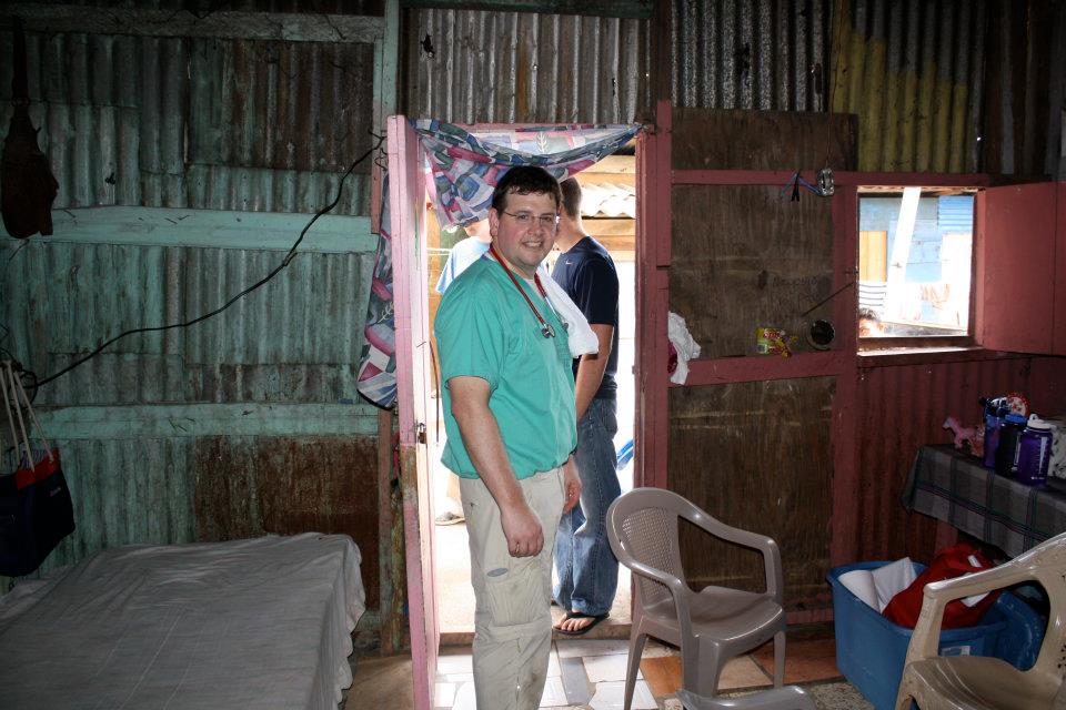 Greg Moore preparing for a Honduran village volunteer medical clinic in the home of a family who generously offered it for use for the day. 