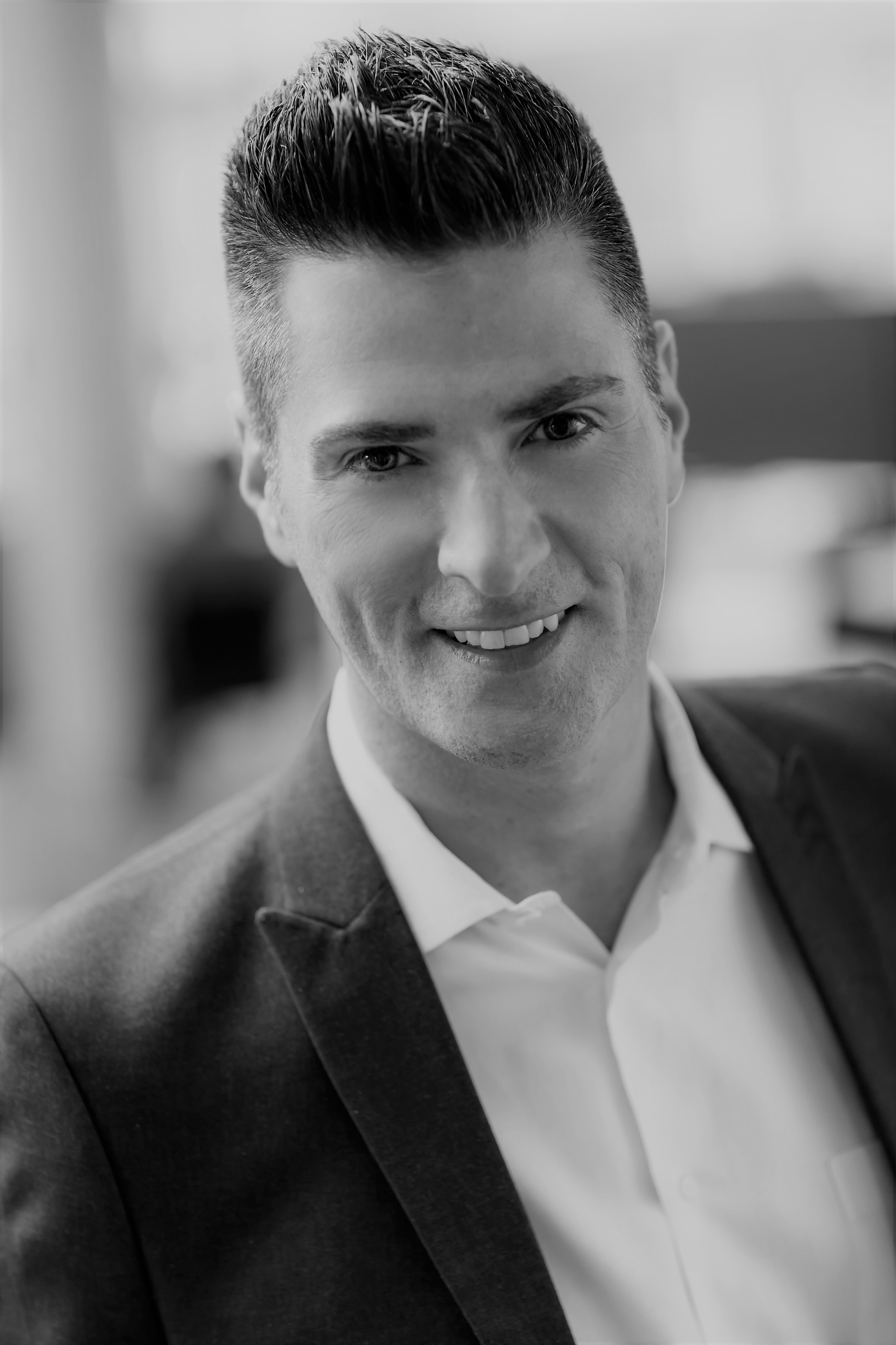 Head shot of Anthony Salcito wearing a suit and tie