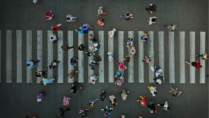 Aerial view of people walking in a crosswalk