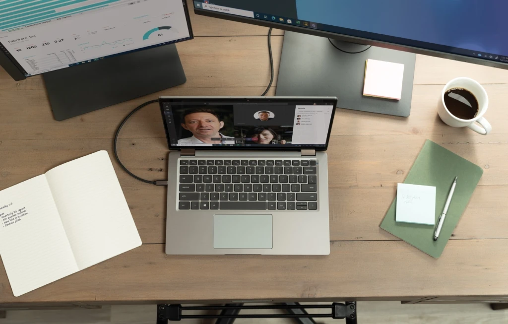 a desk with a computer