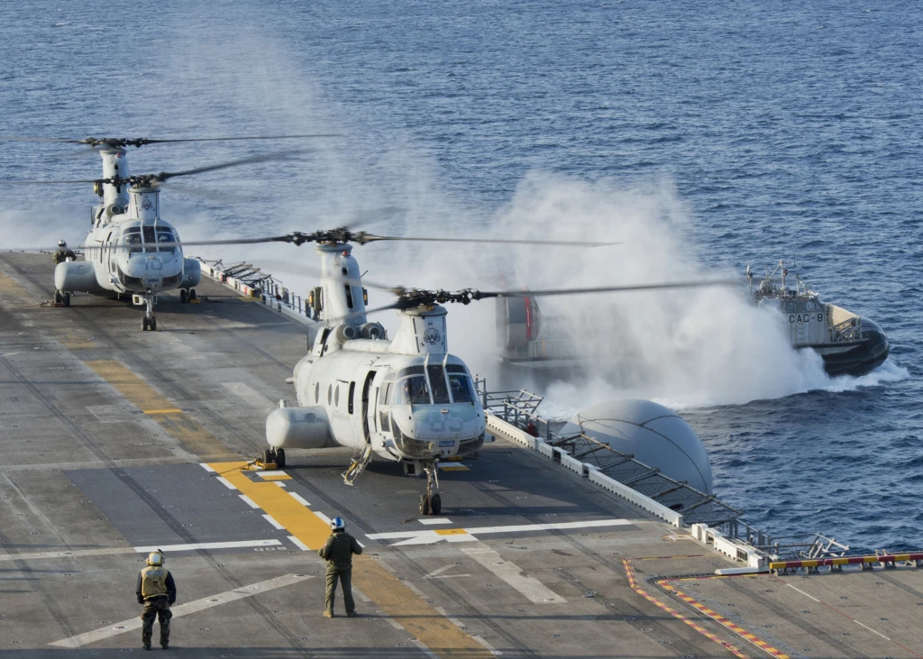 Two CH-46E Sea Knight helicopters on the flight deck of USS Bonhomme Richard.