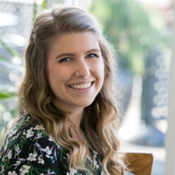 a woman smiling for the camera