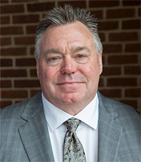 a man wearing a suit and tie