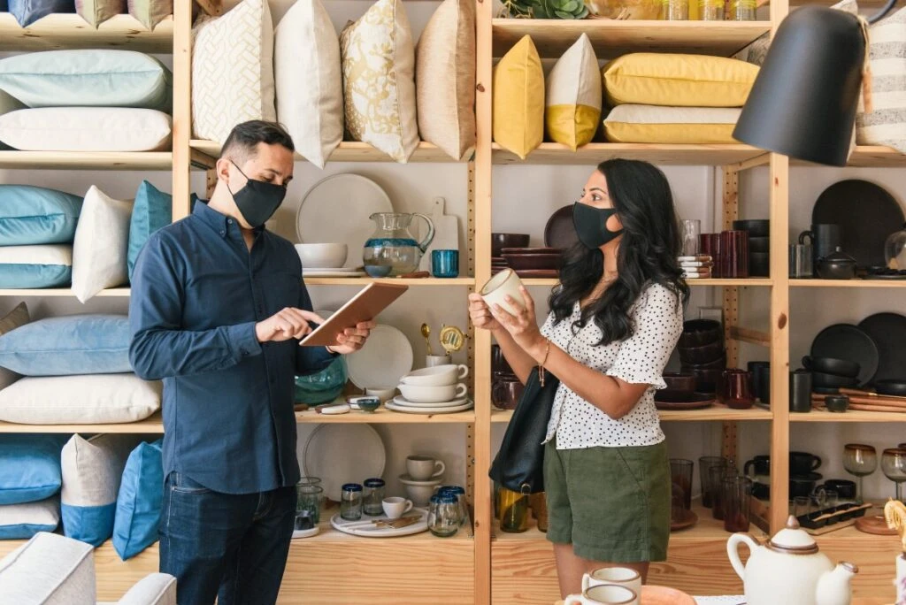 Two people in retail store