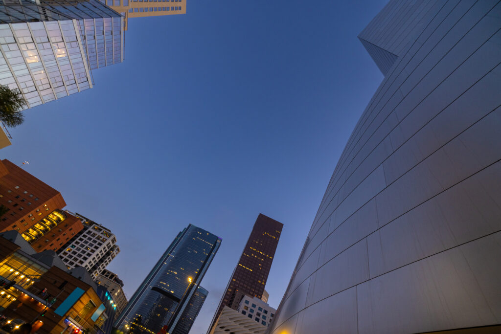 Ground-up view of the city's architecture and skyline at twilight