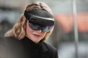 Woman using Microsoft HoloLens 2 for remote collaboration