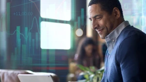 man looking at his monitor