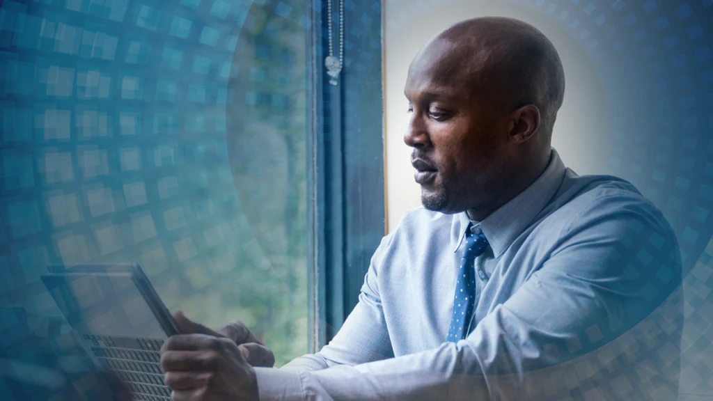 Man looking down at his phone