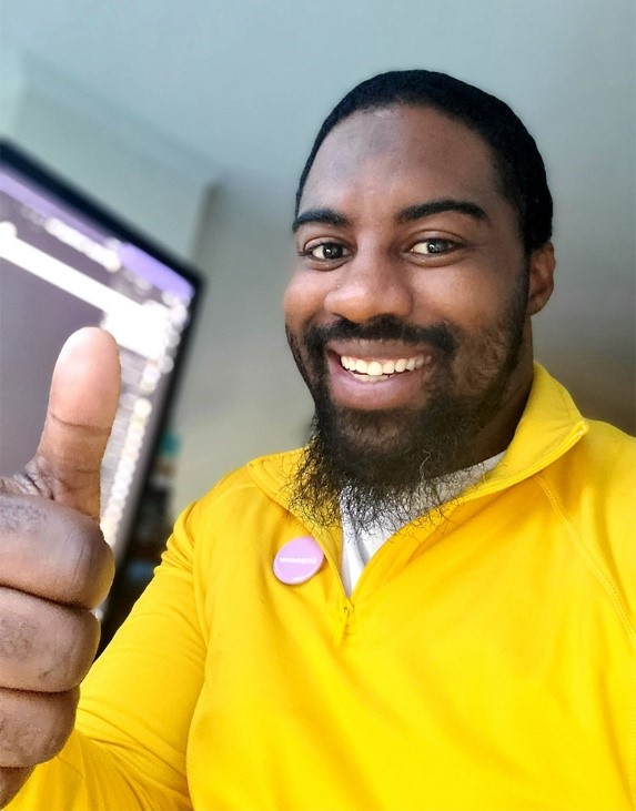 Microsoft Store manager Ethaniel Sinclair works from home in Alexandria, Virginia.