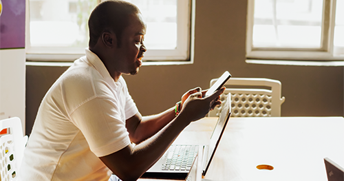 An image of an African male founder working in conference room location in Ghana.