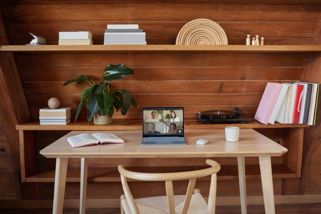 Surface Laptop Go on table running Teams meeting.