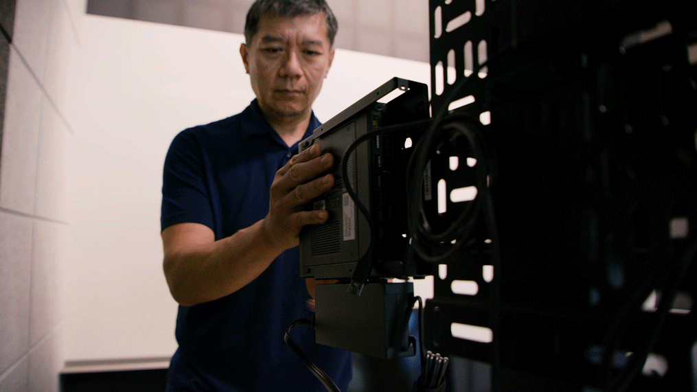 a man standing in front of a mirror posing for the camera