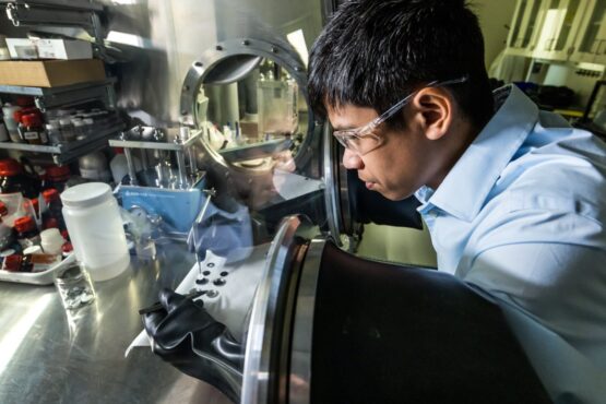 Dan Thien Nguyen, a PNNL materials scientist, assembles a coin cell with the synthesized solid electrolyte.