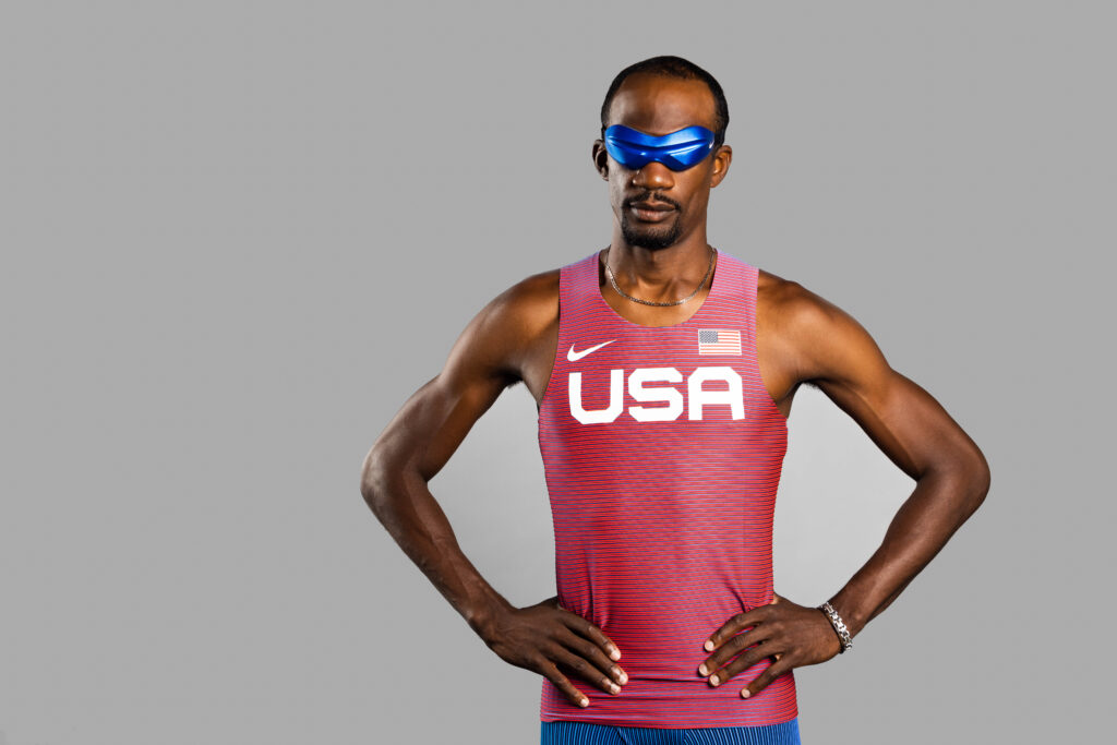 A portrait of Lex Gillette wearing a Team USA track uniform