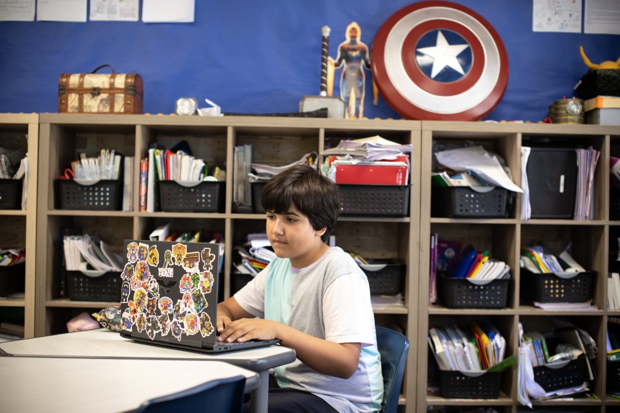 A student sitting in a classroom