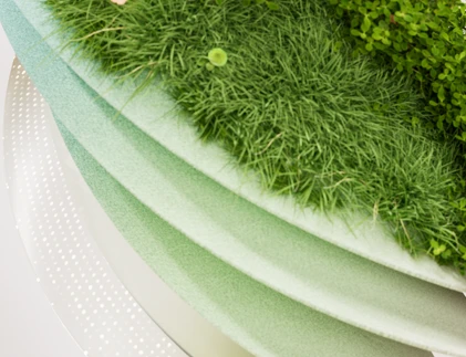 A decorative abstract image of green and cream colors