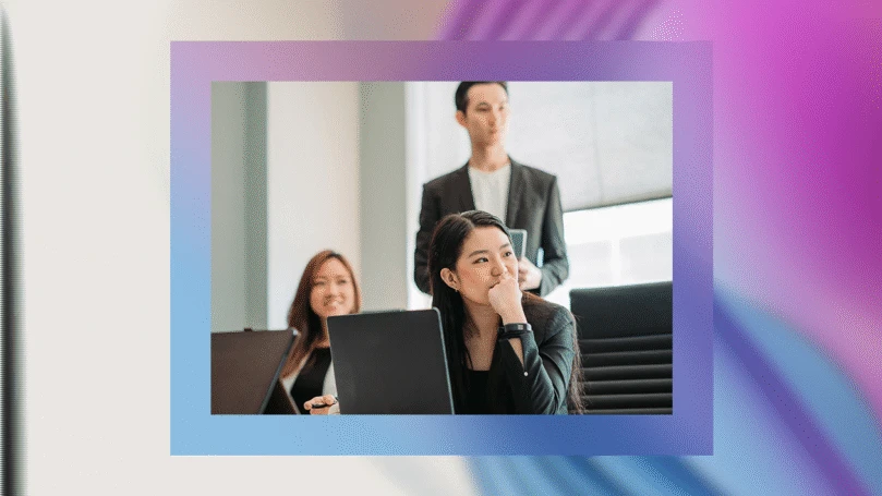 Three people in a boardroom listening to a meeting on a purple and blue background of abstract shapes.