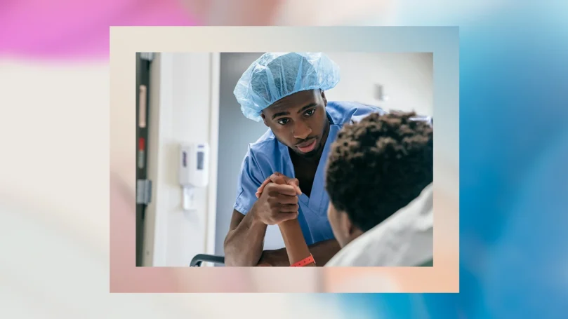 Nurse providing support to a patient in a hospital setting.