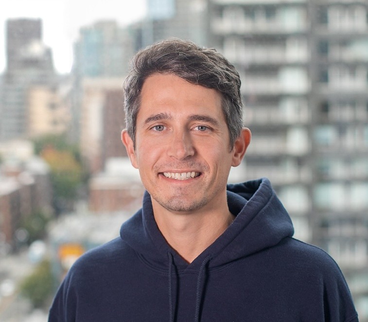 A man smiling at camera