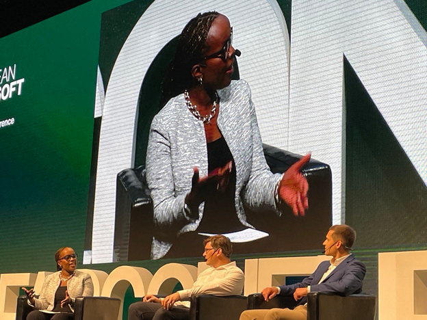 Wangui McKelvey on stage of the Day 3 keynote at the FabCon 2024 event.