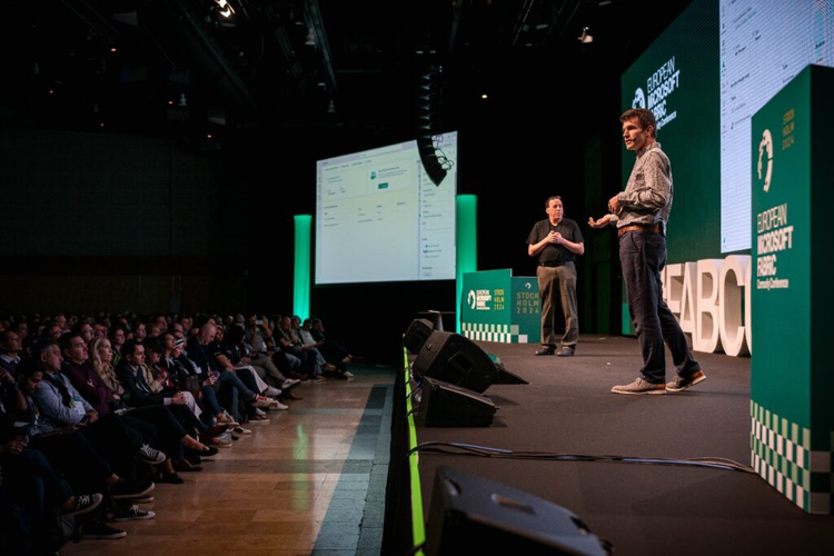 Man giving presentation on stage