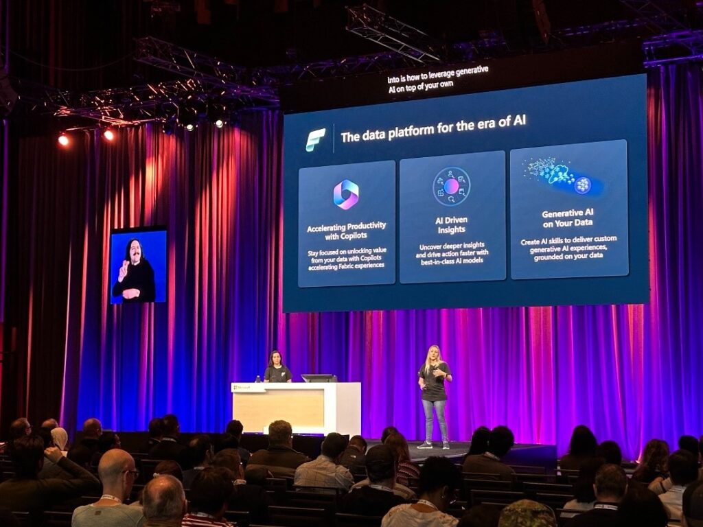 Justyna Lucznik, Partner Director of PM, presenting at Ignite on the AI-infused components of Microsoft Fabric.