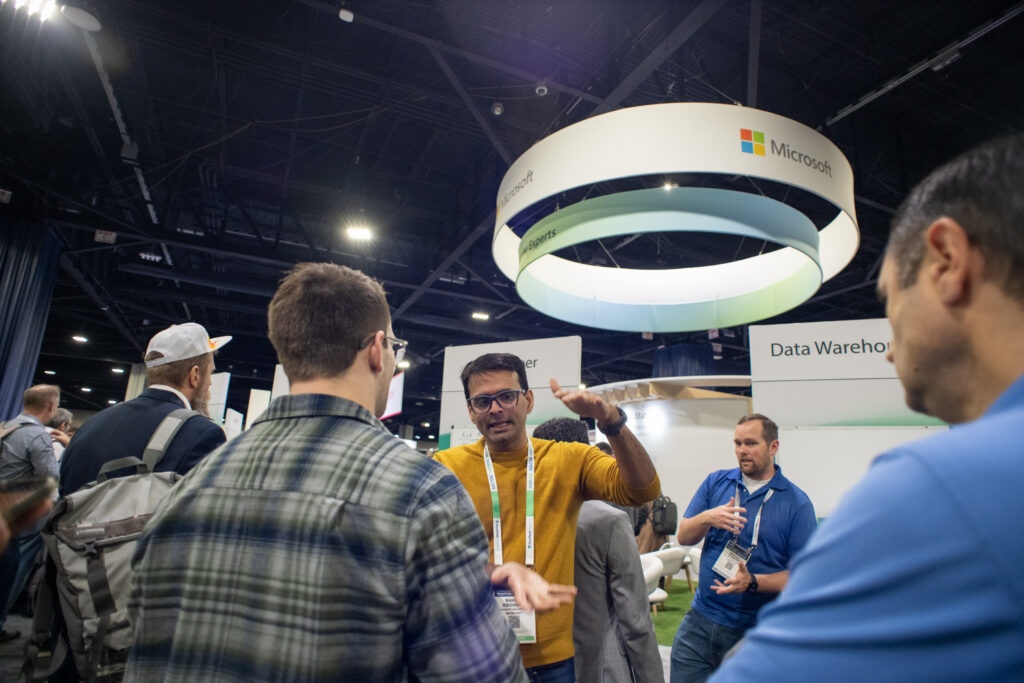 People talking at the Expo Hall.