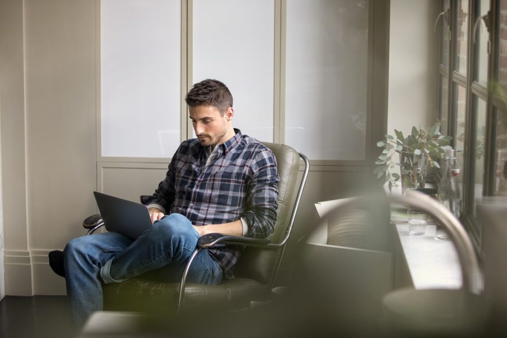 Male with laptop.