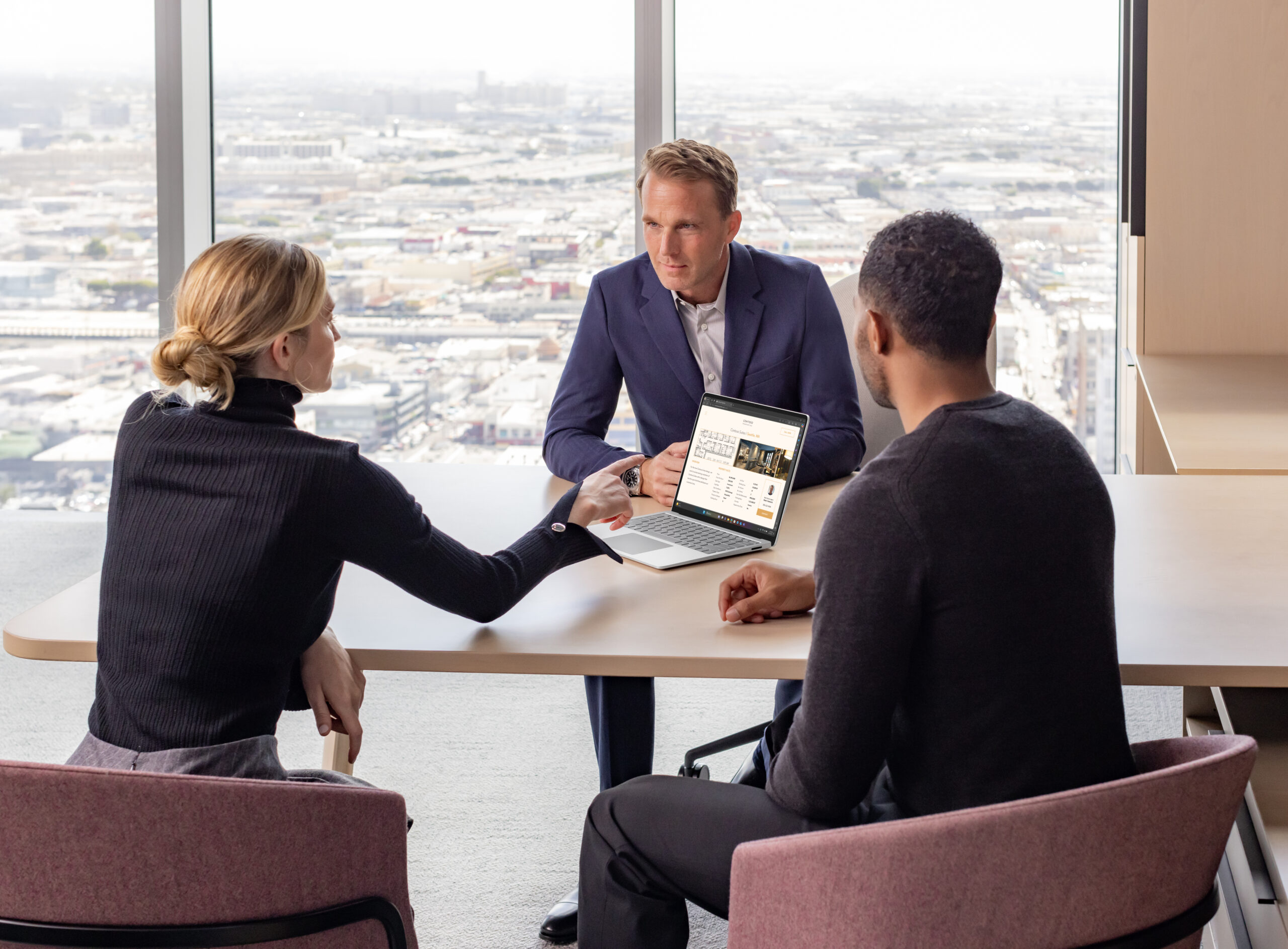 A group of people sitting around a table