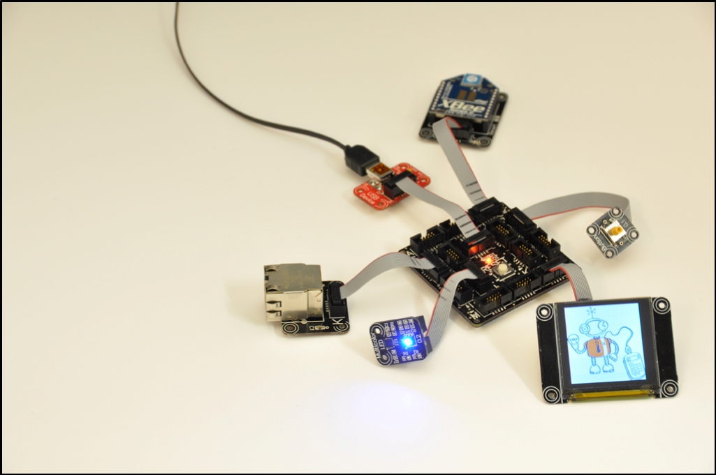 connected hardware modules with a connected display of a cartoon robot